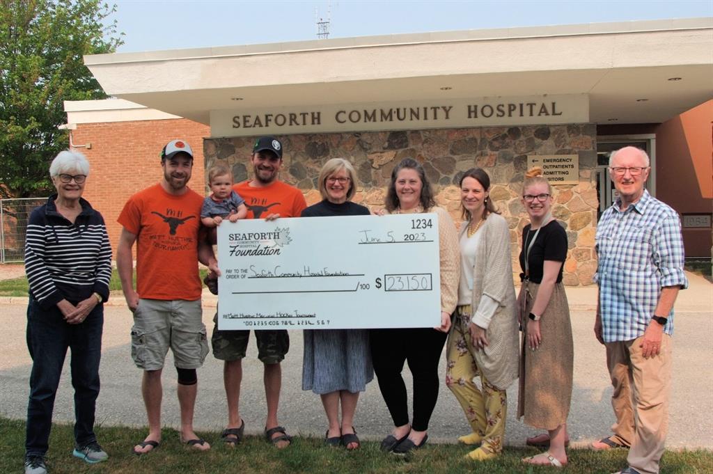 Group photo taken during donation announcement